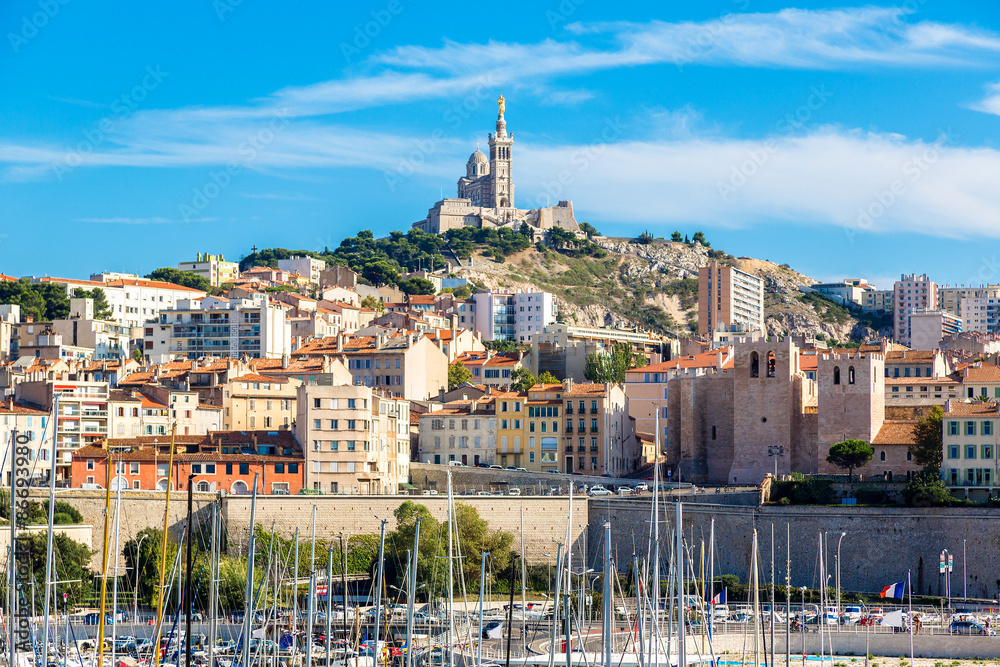 Fototapeta premium Notre Dame de la Garde and olf port in Marseille, France