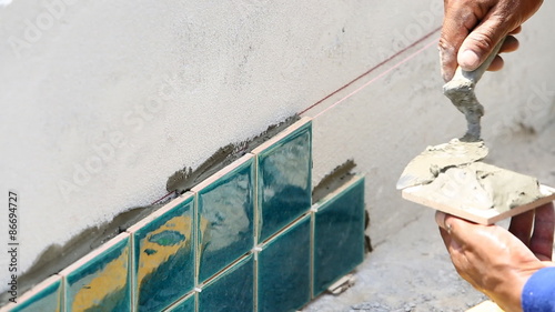 Wall tile installation for house building 