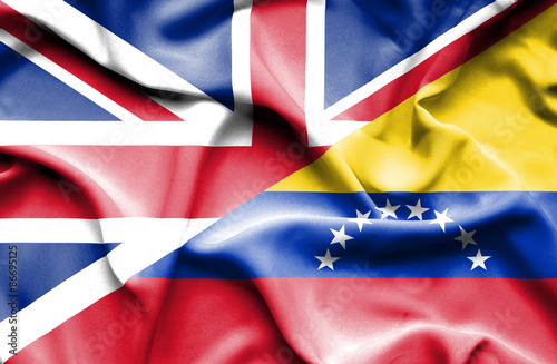 Waving flag of Venezuela and Great Britain