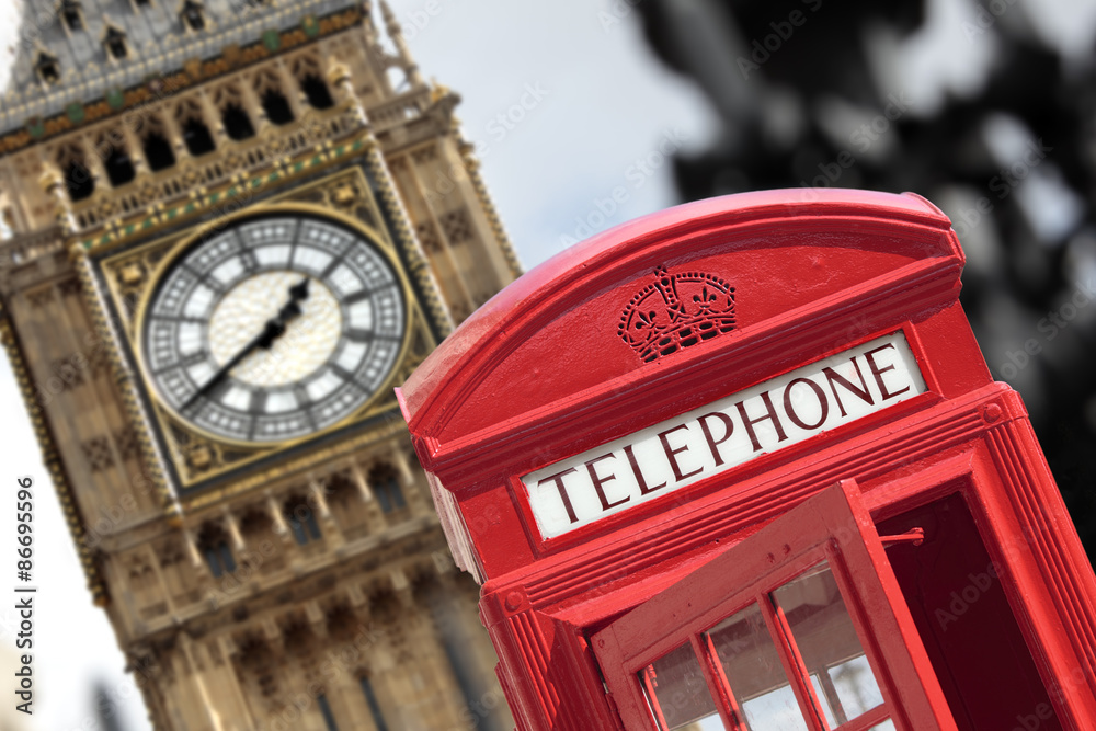 Obraz premium London red telephone box with Big Ben clock tower in the background photo