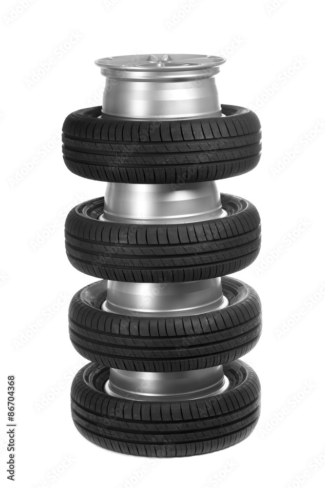 Stack of car wheels and tires. Stack of car wheels and tires.