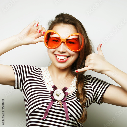 young woman with big party glasses
