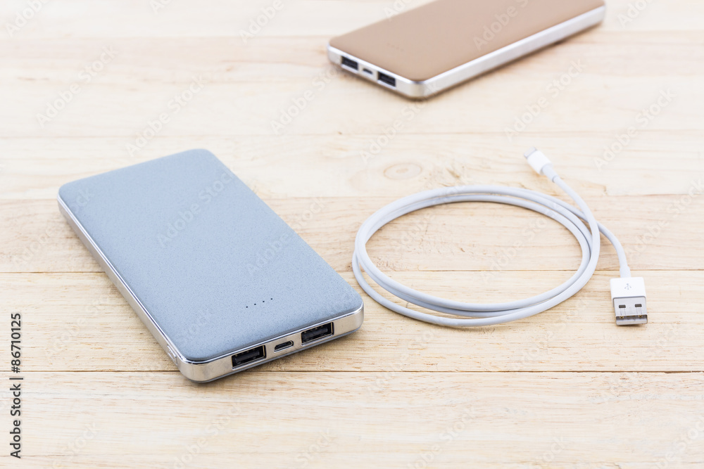 Power bank and USB cable for smartphone. Power bank and USB cable for smartphone.