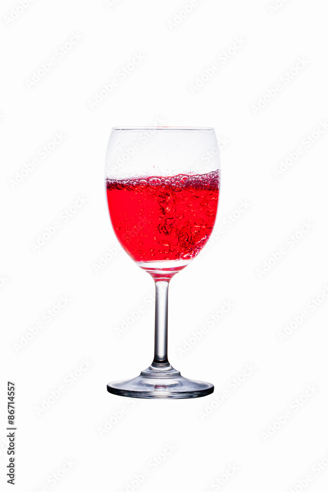 glass and red liquid isolated on white background. glass and red liquid isolated on white background.