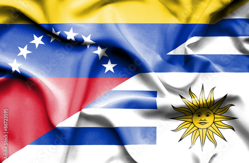 Waving flag of Uruguay and Venezuela