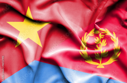 Waving flag of Eritrea and Vietnam