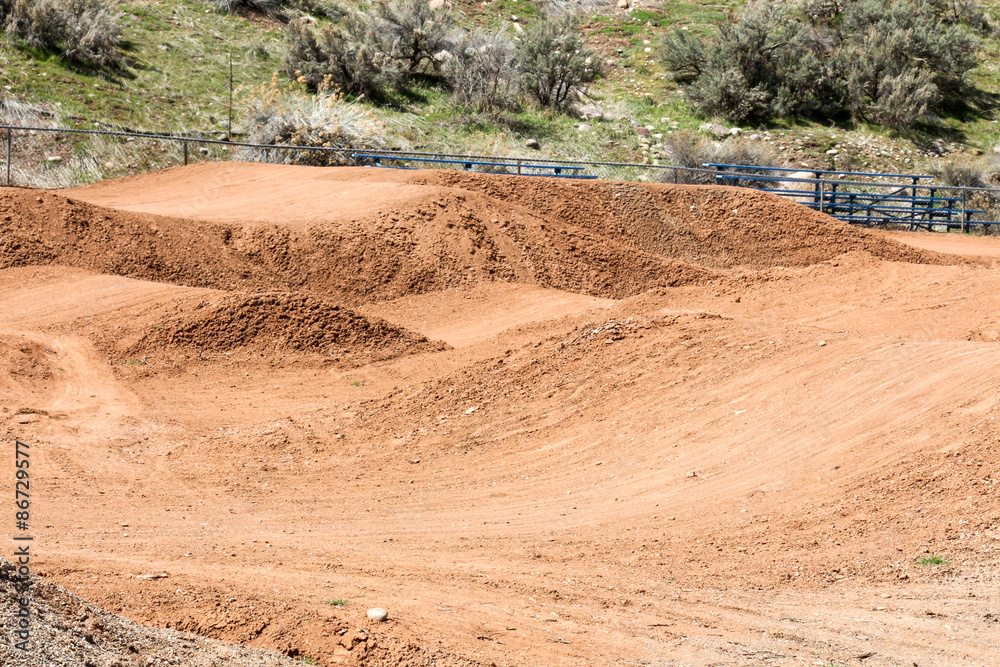 Obraz premium Empty cyclocross track with the bumpy dirt course