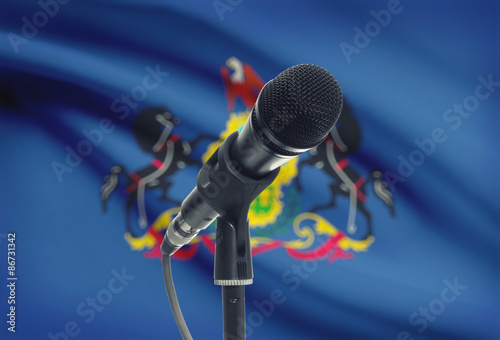 Microphone on stand with US state flag on background - Pennsylvania © niyazz
