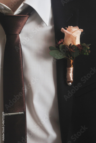 details of groom's suit