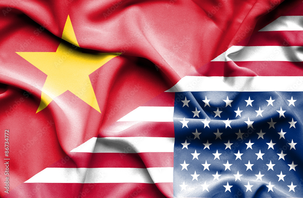 Fototapeta premium Waving flag of United States of America and Vietnam