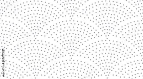 Vector seamless background in the form of fish scales consisting of blue stars. The fountain of the stars on white.