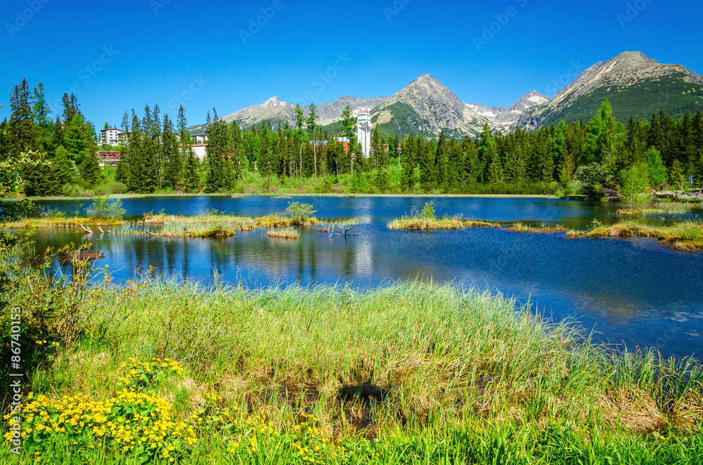Beautiful mountain lake and high mountains peaks 