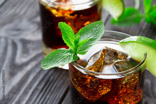cocktail with cola, lime and mint