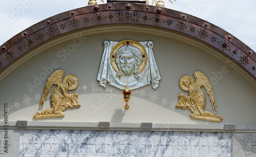 Vászonkép Lunette on Orthodox church with face of Jesus and two angels