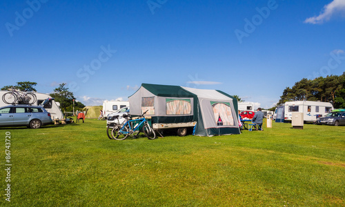 Embleton, Northumberland, 27th June 2015. campers and caravaners enjoying the recent summer weather.