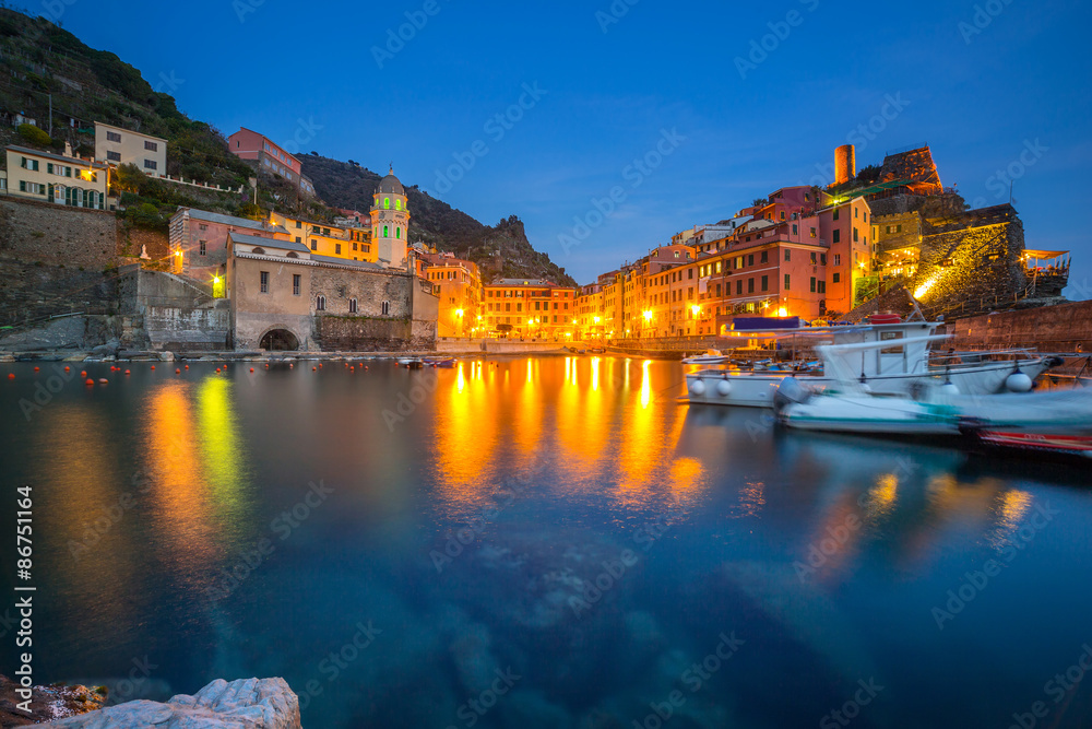 Vernazza town on the coast of Ligurian Sea at dusk, Italy