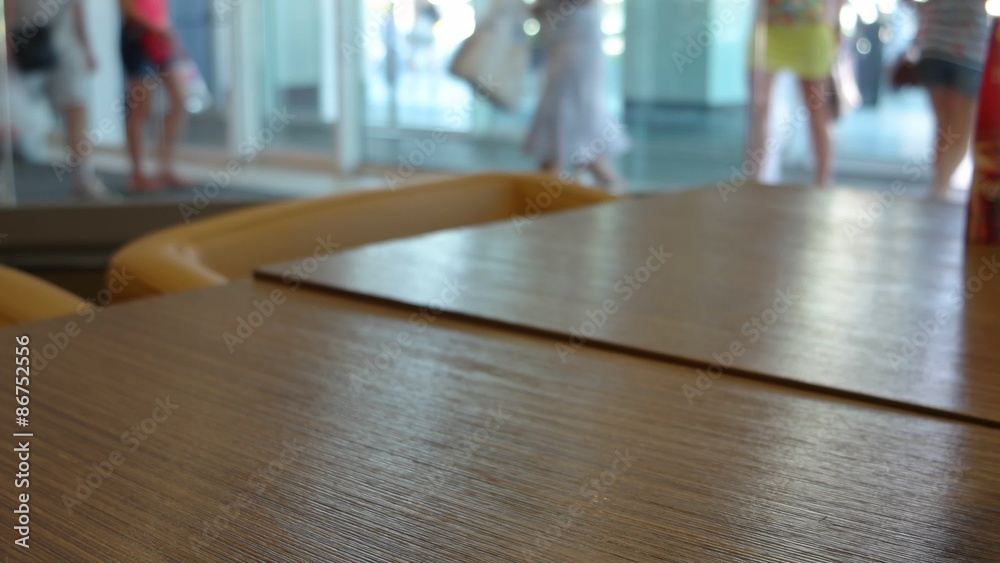 Glass with ice cubes on wooden table Glass with ice cubes on wooden table