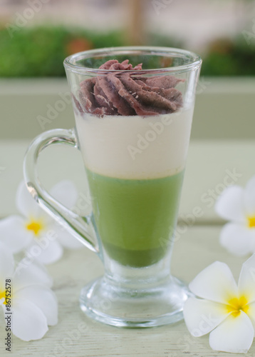 Green tea and red bean pudding in a glass