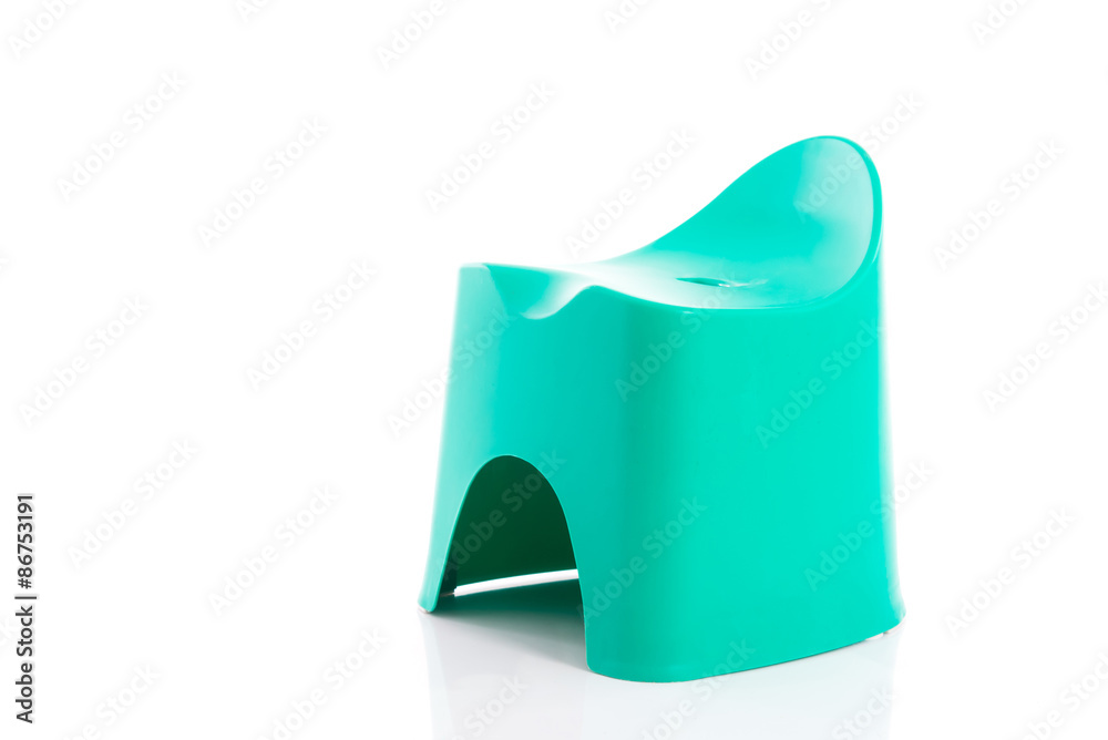 Small green plastic stool for kids isolated on white background Small green plastic stool for kids isolated on white background
