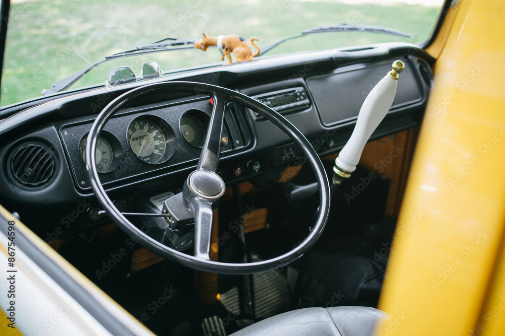 A close up of the dashboard and interior of a car