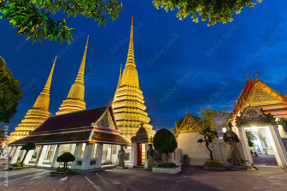 Fototapeta premium Wat Pho, Bangkok, Thailand. Also known as Wat Phra Chetuphon, 'Wat' means temple in Thai. The temple is one of Bangkok's most famous tourist sites. The temple has it's origins dating back to 1788.