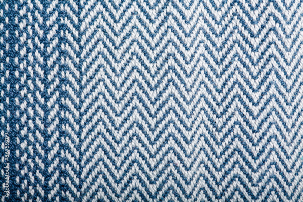 Handmade fabric with blue striped texture. Clothes background