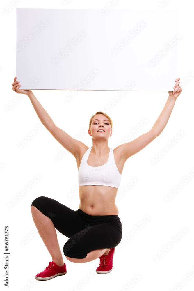 Fitness sporty woman holding blank empty ad banner Fitness sporty woman holding blank empty ad banner