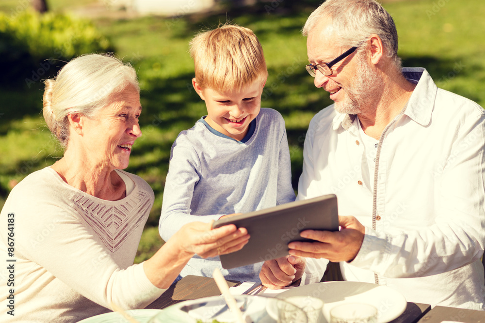 happy family with tablet pc outdoors happy family with tablet pc outdoors