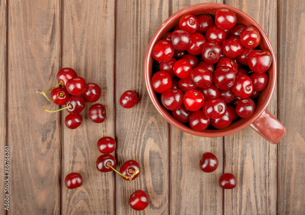 Cherries on wooden table background Cherries on wooden table background