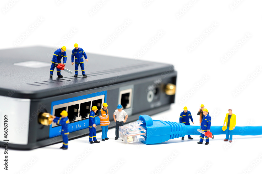 Technicians connecting network cable. Network connection concept Technicians connecting network cable. Network connection concept