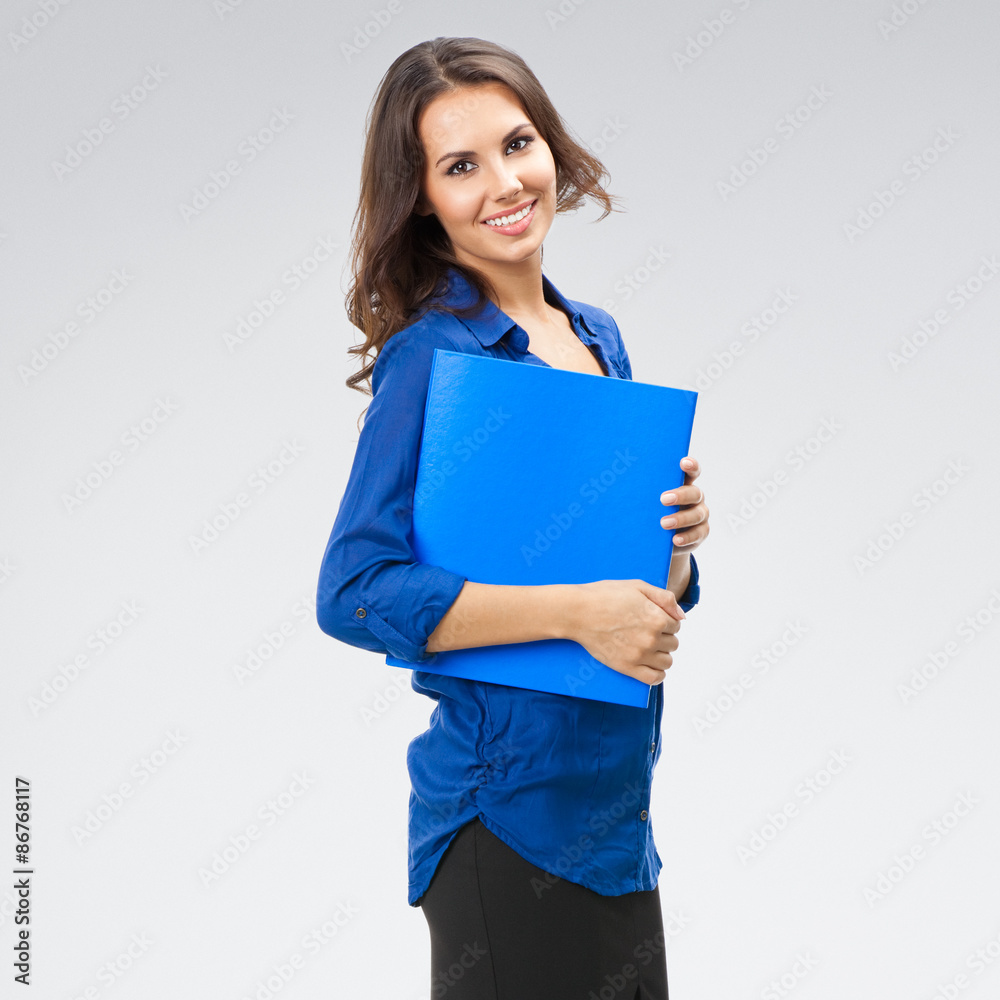 happy smiling businesswoman with blue folder with copyspace, on happy smiling businesswoman with blue folder with copyspace, on