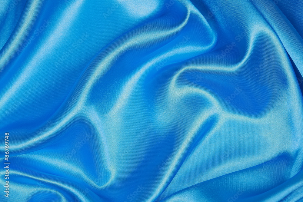 Obraz premium Blue Silk cloth of wavy abstract background
