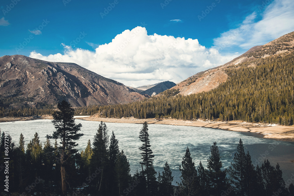 Frozen lake in Yosemite National Park, Mountains and Valley view