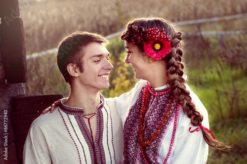 Young Ukrainian couple in traditional clothes