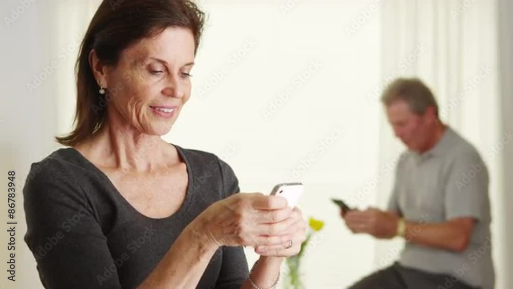 Happy senior woman using smartphone Happy senior woman using smartphone