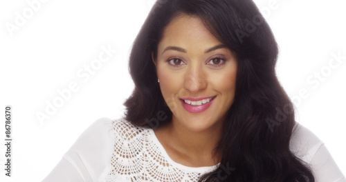 Hispanic woman smiling at camera