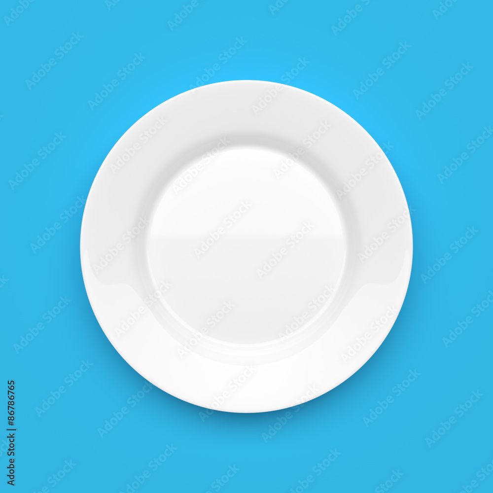 Empty white ceramic round plate on blue