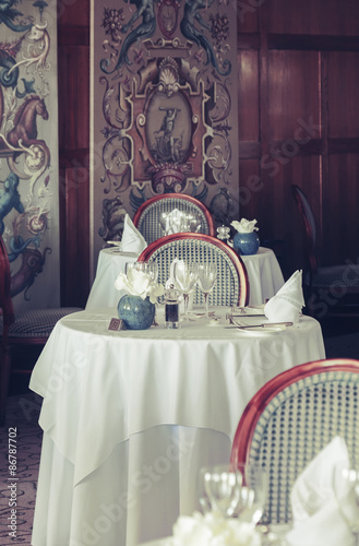 table in stylish restaurant, english design