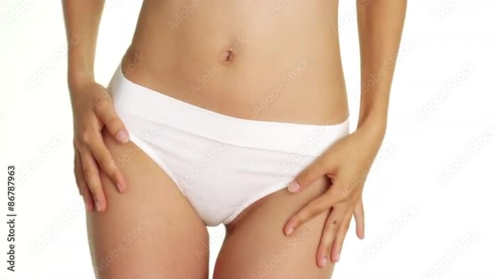 Front view of woman swaying hips in white underwear Front view of woman swaying hips in white underwear