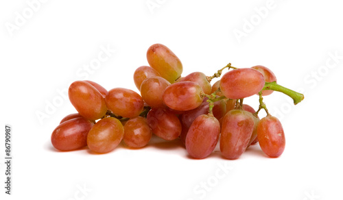 Obraz na plátně Juicy Grapes – Juicy red grapes, fresh from the vine, on a white background