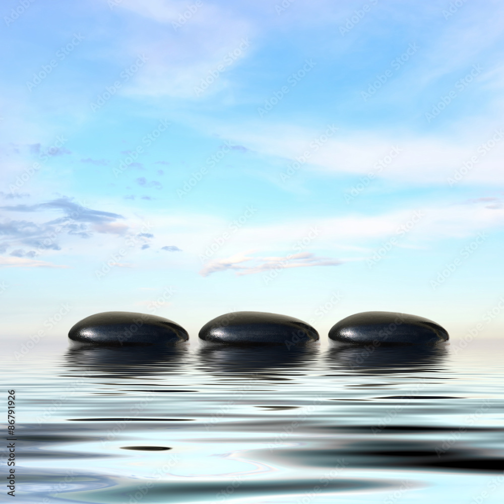 Naklejka Zen spa concept background-Zen czarne kamienie do masażu odbicie w wodzie