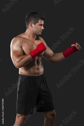 Man practicing body combat © ikostudio