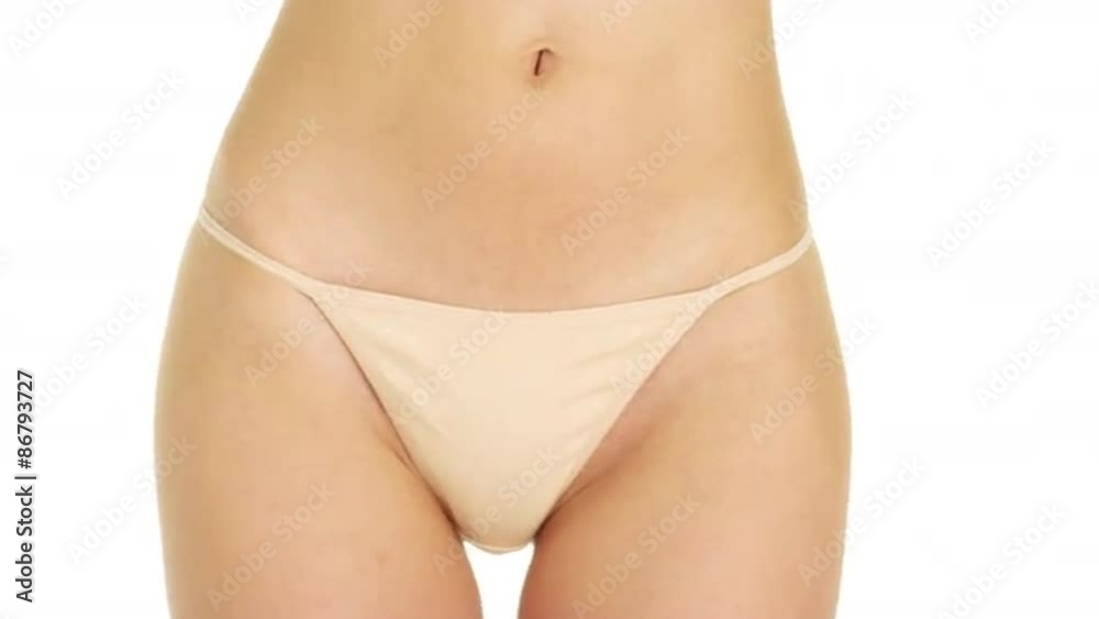 Woman in a beige bikini Woman in a beige bikini