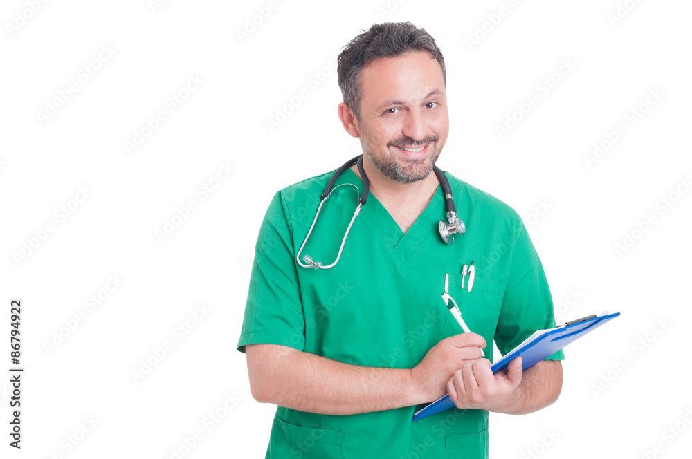 Handsome and young medic or doctor using clipboard