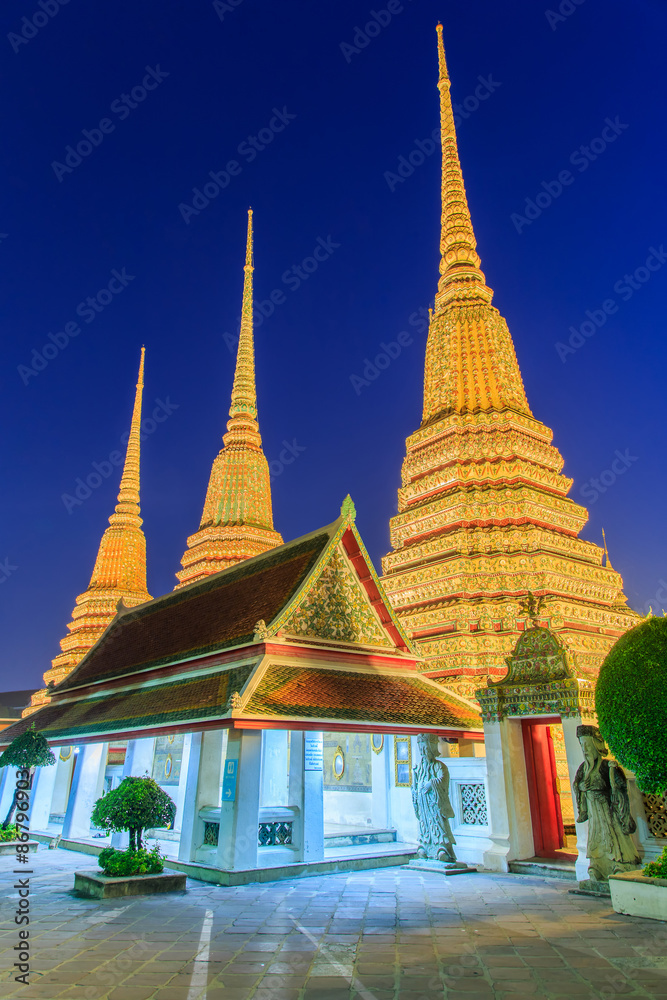 Fototapeta premium Wat Pho, Bangkok, Thailand. Also known as Wat Phra Chetuphon, 'Wat' means temple in Thai. The temple is one of Bangkok's most famous tourist sites. The temple has it's origins dating back to 1788.