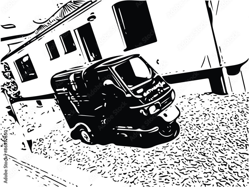 Kleines Auto vorm Haus
