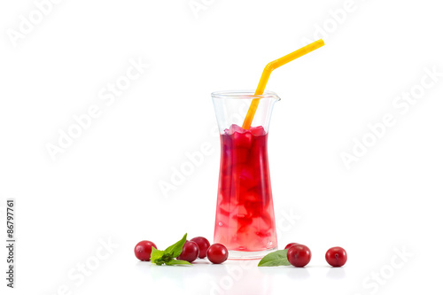 Glass of tasty jelly coconut with asian cherry on white backgroud