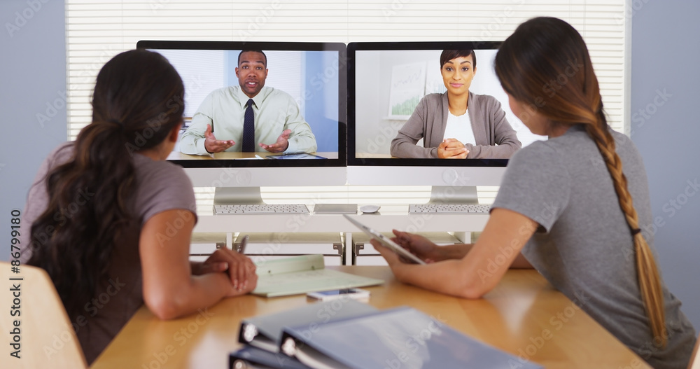 Diverse business colleagues holding a video conference meeting Diverse business colleagues holding a video conference meeting