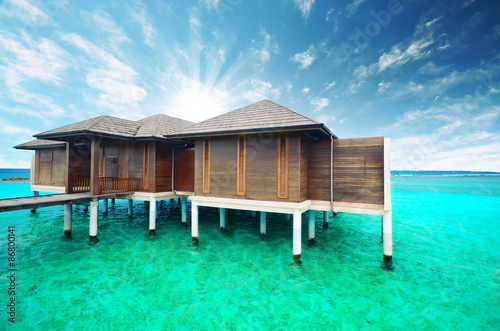 Water villas on tropical caribbean island, Maldives 