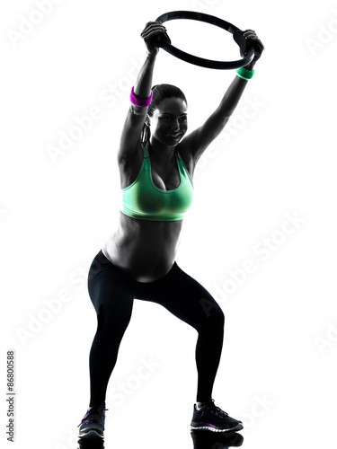 pregnant woman fitness exercises silhouette © snaptitude